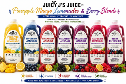 Juicy's Juice advertisement featuring eight bottled beverage blends: Pineapple Mango Lemonade, Blueberry Lemonade, Strawberry Lemonade, Blackberry Lemonade, Mixed Berry Blend, Raspberry Lemonade, and Berry Refresher. The bottles are arranged in a row with fresh fruits and berries around them on a white background with colorful text banners.