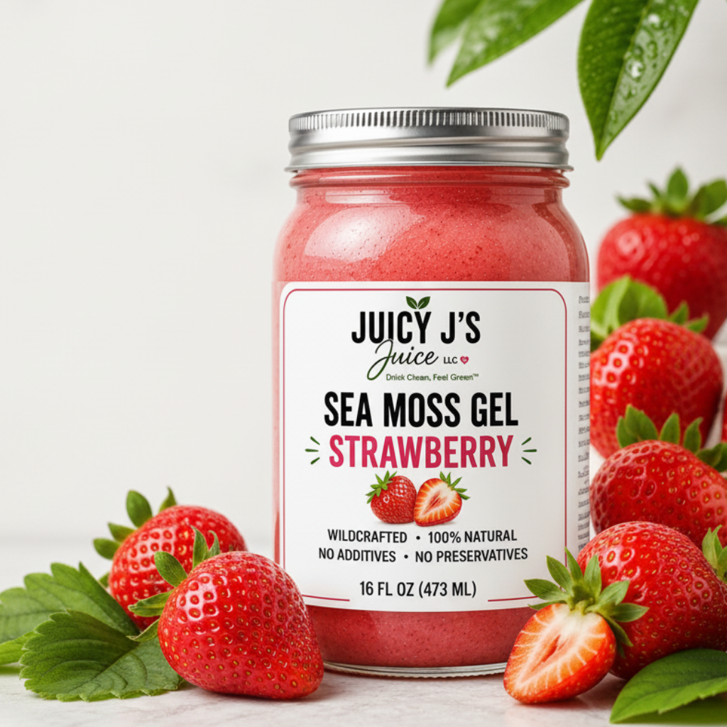 Juicy J's Sea Moss Gel in a 16 oz jar, strawberry flavor. The product is shown in a clear glass jar filled with pink-red sea moss gel, next to fresh strawberries and green leaves on a white background with promotional text and badges.